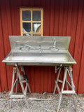 Rostfri diskho med konsoler